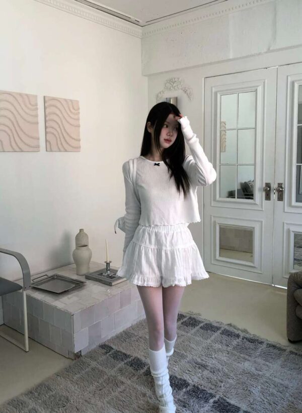 Z06 雷諾瓦的小蝴蝶結捲邊針織上衣